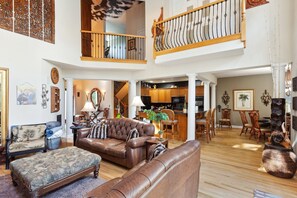 Téléviseur, table de baby-foot, table de ping-pong, bureau