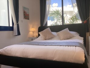 1 غرفة نوم ومكواة/لوح كي وواي فاي مجانًا وملاءات أسرّة