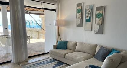 Spacious 4-bedroom house with WiFi, AC in welcoming Punta Sal