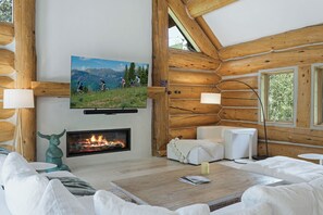 Televisión, chimenea, mesa de ping pong