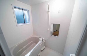 Hair dryer, bidet, towels, soap
