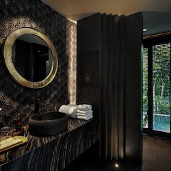 Eco-friendly toiletries, hair dryer, slippers, bidet