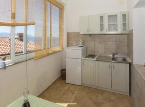 Double Room (Double Room with Private Balcony (A2)) | Private kitchenette
