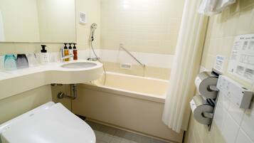 Combined shower/tub, hair dryer, slippers, shampoo