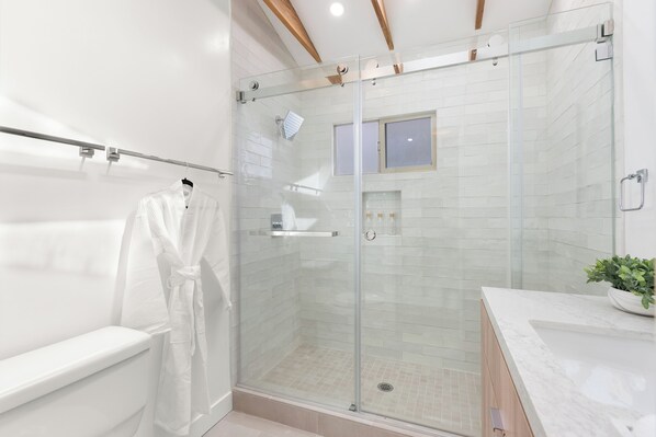 Hair dryer, towels, soap, toilet paper
