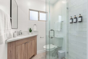 Hair dryer, towels, soap, toilet paper