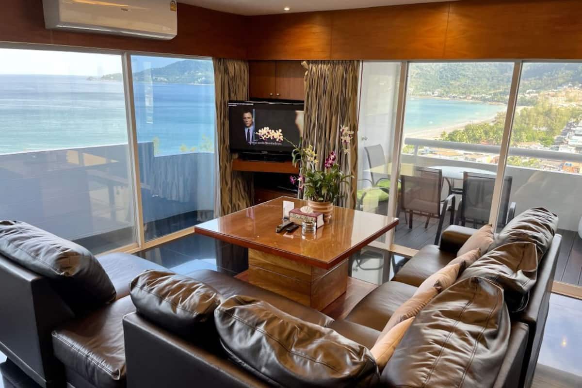 Panoramic Apartment, Balcony, Ocean View | Living area | Flat-screen TV