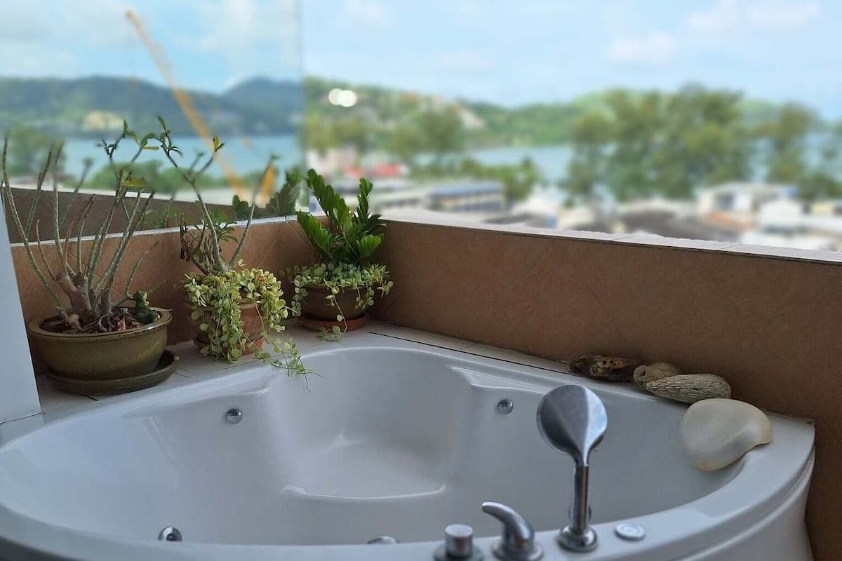 Condo, Sea View | Private spa tub