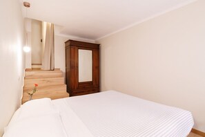 1 habitación, tabla de planchar con plancha, wifi y ropa de cama 