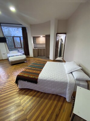 Family Triple Room, City View | Laptop workspace, free WiFi - Hotel Chasky Cuenca (Cuenca)