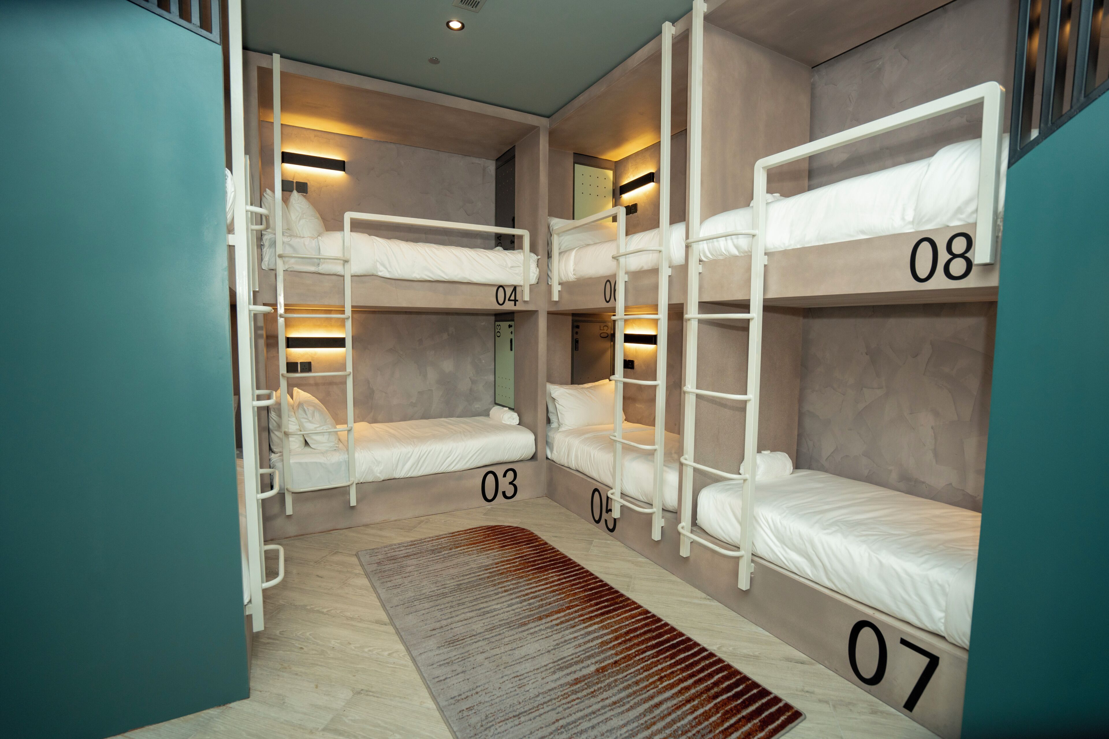 Bed in a 8 Bed Mixed Dorm with Ensuite Bathroom | Premium bedding, down comforters, desk, laptop workspace