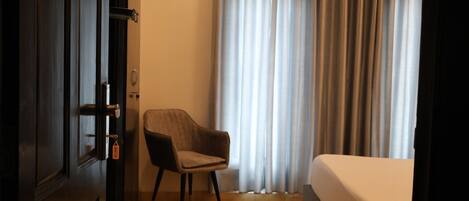 Room, City View | Room amenity