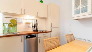 Apartment | Private kitchen | Electric kettle, toaster, high chair