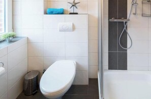 Een douche, een haardroger