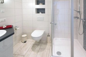 Shower, hair dryer, toilet paper