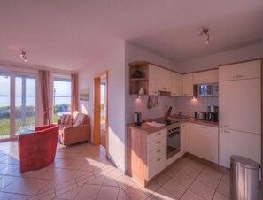 Apartment | Private kitchen | Electric kettle, toaster, highchair