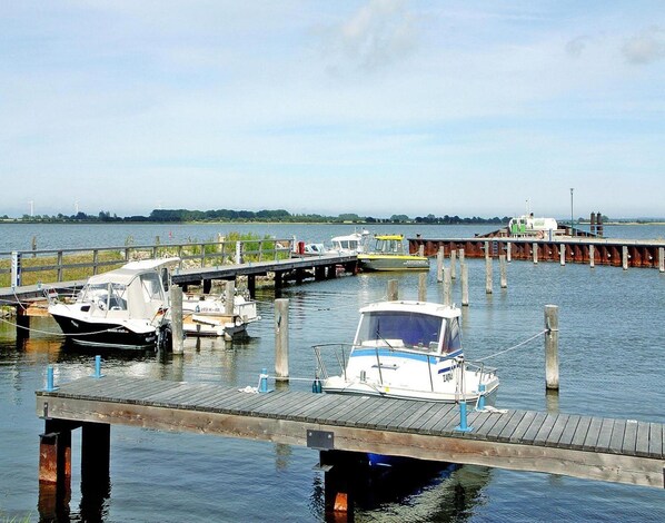 Mooring facilities and boats are available at this tranquil marina.