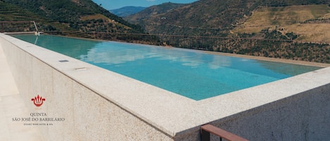 Seasonal outdoor pool, pool umbrellas, sun loungers