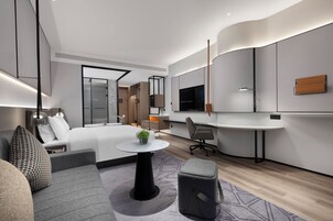 Ropa de cama de alta calidad y minibar 