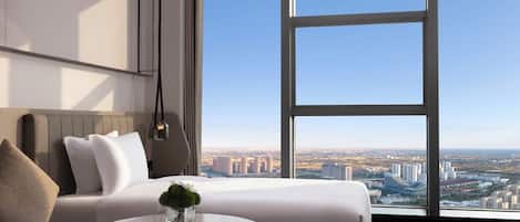 Ropa de cama de alta calidad, minibar, caja fuerte y cortinas opacas