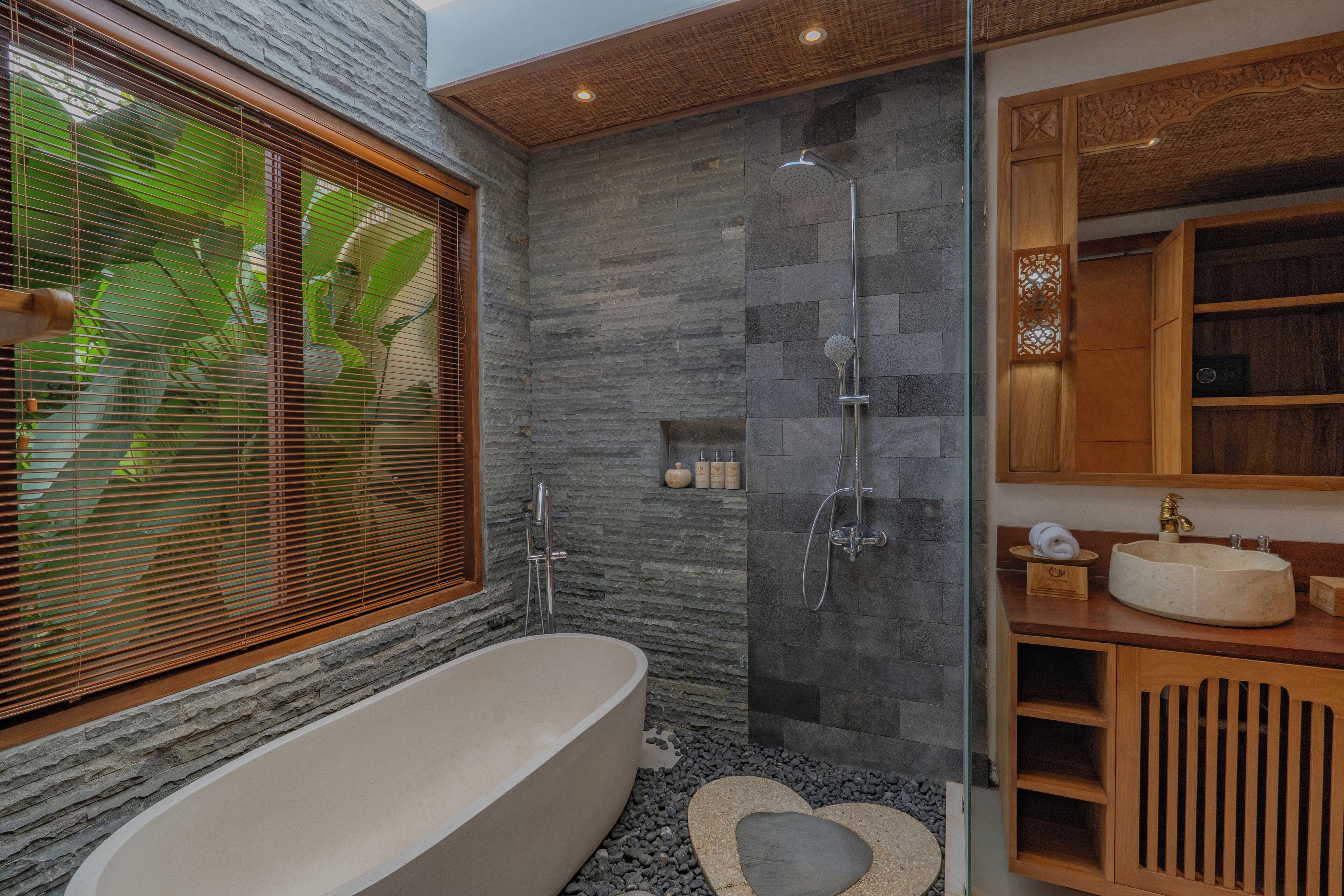 Separate tub and shower, hair dryer, bathrobes, slippers