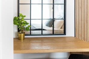 Departamento Deluxe, Terraza, vista al mar | Ropa de cama de alta calidad, edredón y camas con pillow-top