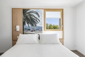 Appartement Confort, 3 chambres, terrasse, vue partielle sur la mer | 2 chambres, literie de qualité, coffre-fort, rideaux d’obscurcissement