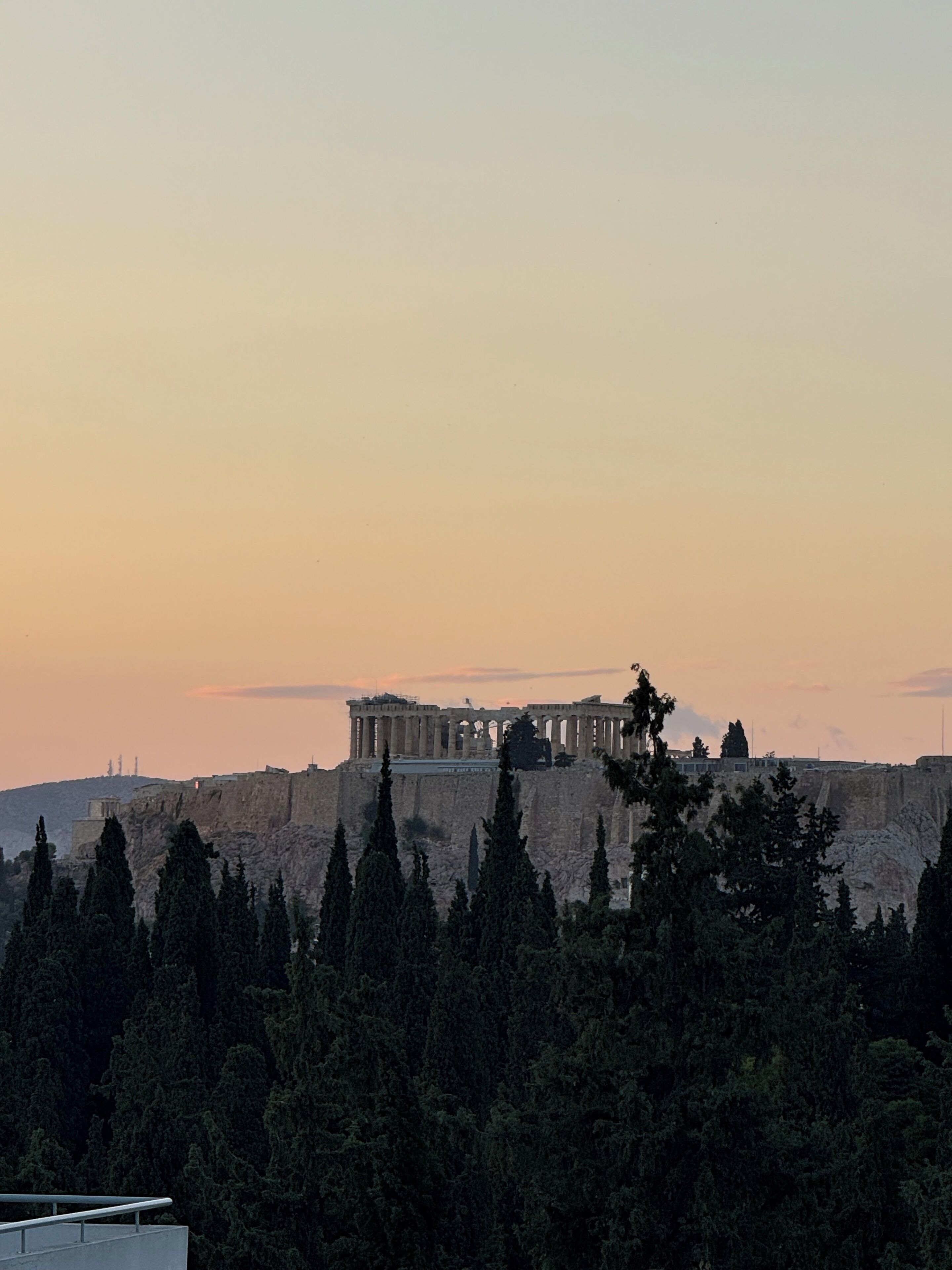 The Acropolis in Athens, Greece, featuring the Parthenon and surrounding ancient ruins.