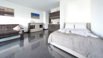 Apartament (20C) | Zona de estar | Una televisión de pantalla plana