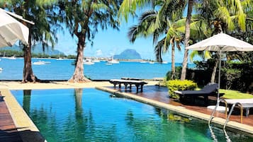 Outdoor pool, pool umbrellas, pool loungers