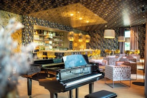 Piano bar, golf course views