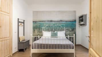 Family Apartment, Balcony | 1 bedroom, iron/ironing board, free WiFi, bed sheets