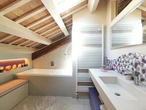 Shower, jetted tub, hair dryer, bidet