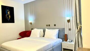 Deluxe Room, Balcony, City View | Desk, laptop workspace, free WiFi