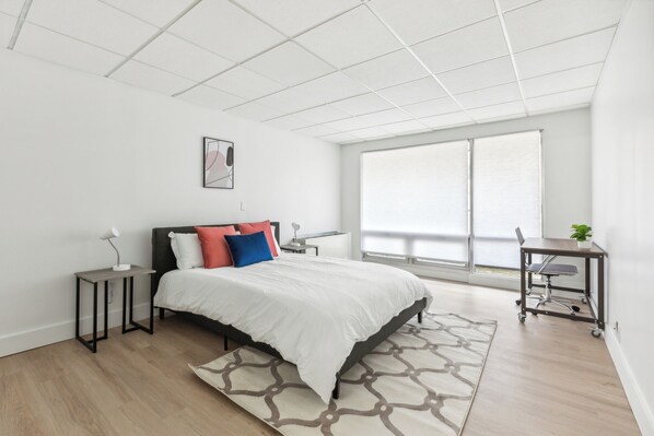 1 bedroom, desk, iron/ironing board, travel crib