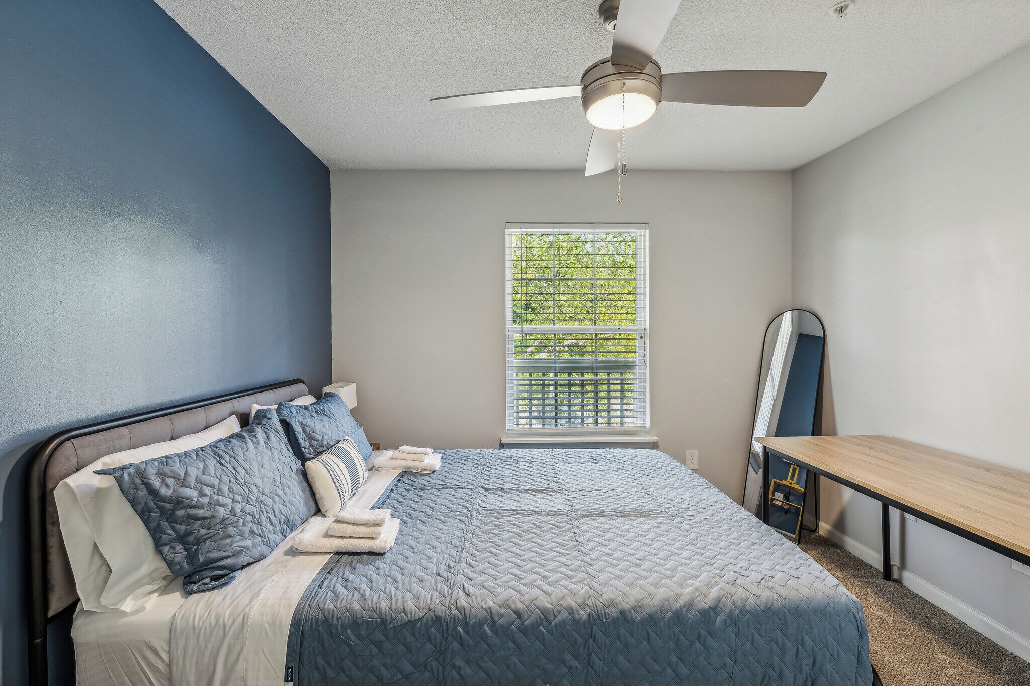 1 bedroom, desk, iron/ironing board, travel crib