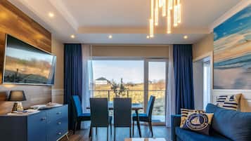 Apartment (16A) | Living area | Flat-screen TV