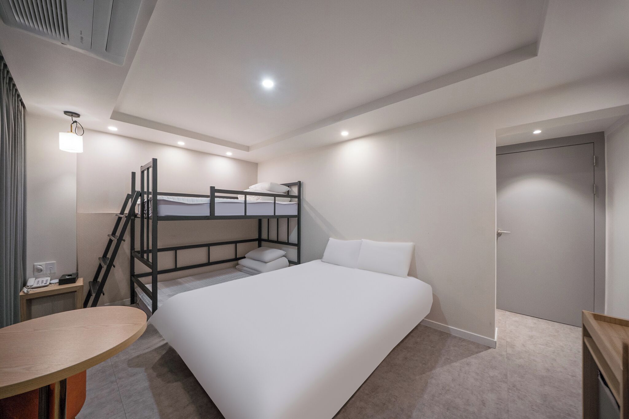 Premium bedding, desk, laptop workspace, blackout curtains