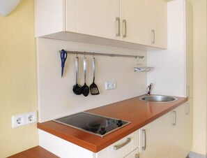 Apartment | Private kitchen | Electric kettle, toaster, high chair