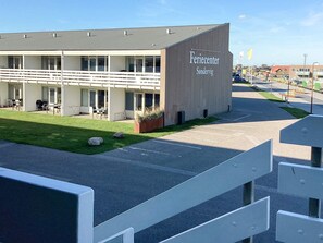A modern building with a sign reading 'Feriecenter Sondervig.'