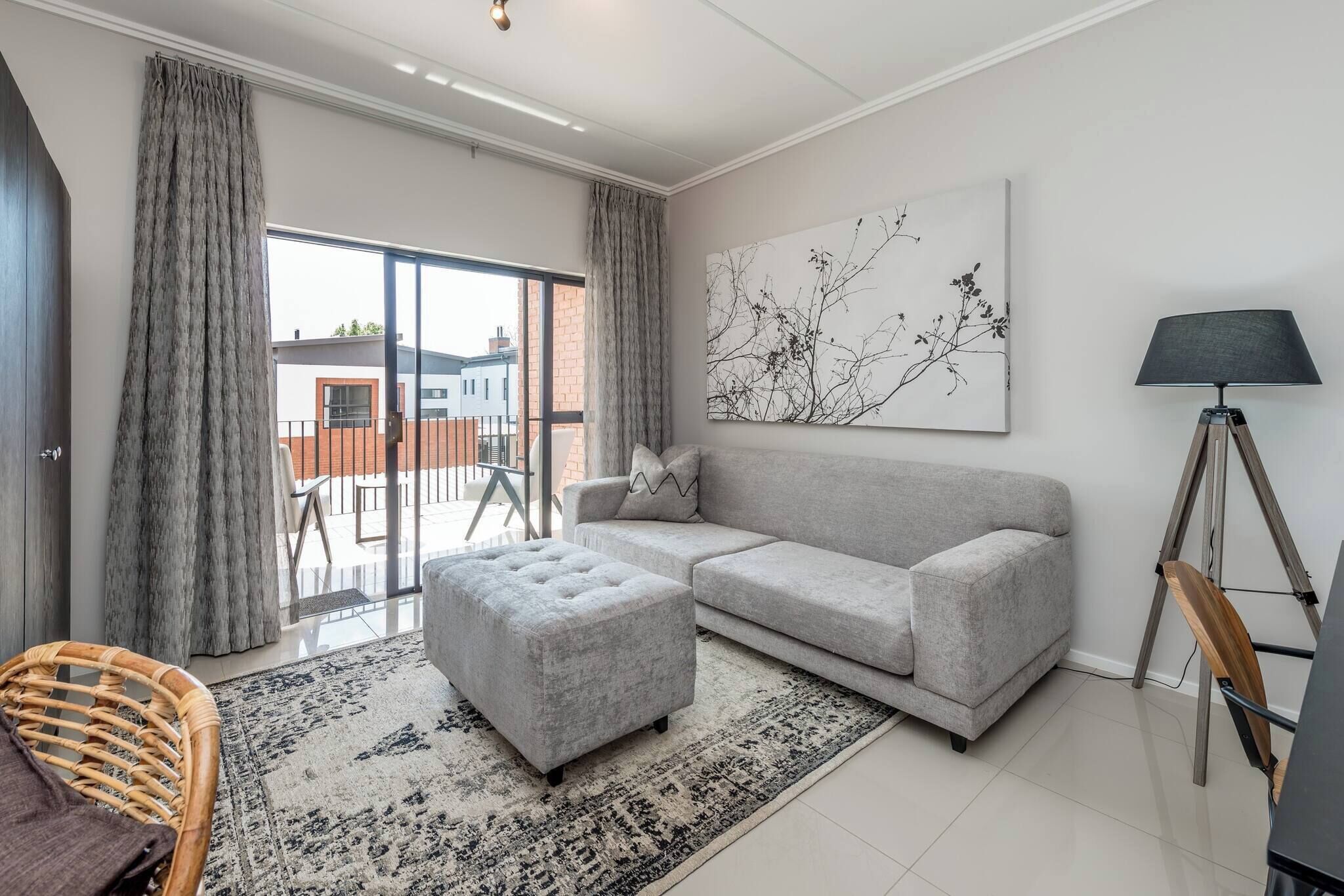 Apartamento, 2 quartos | Área de estar