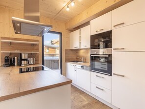 Private kitchen - Attractive Chalet With Terrace (Sankt Georgen am Kreischberg)