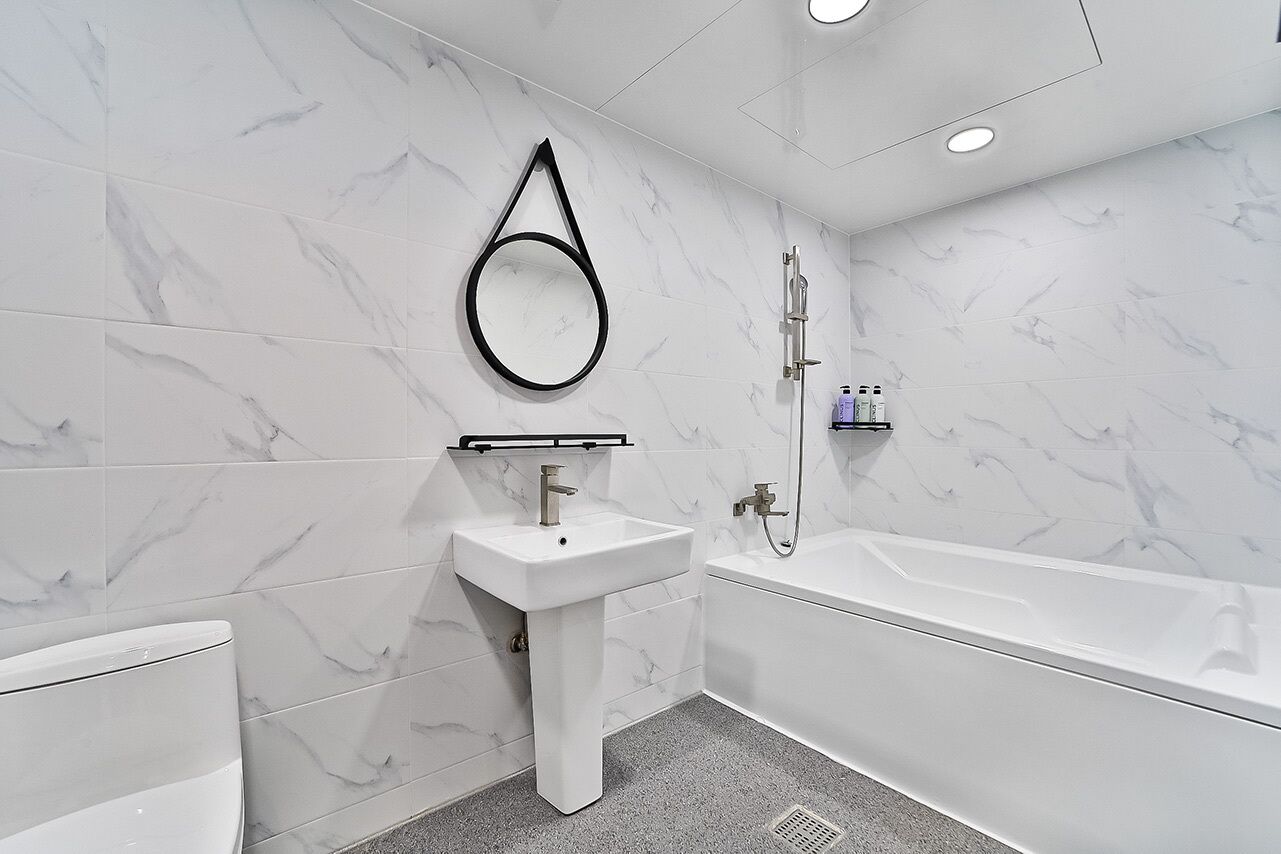 Twin Room | Bathroom | Hair dryer, slippers, towels, soap