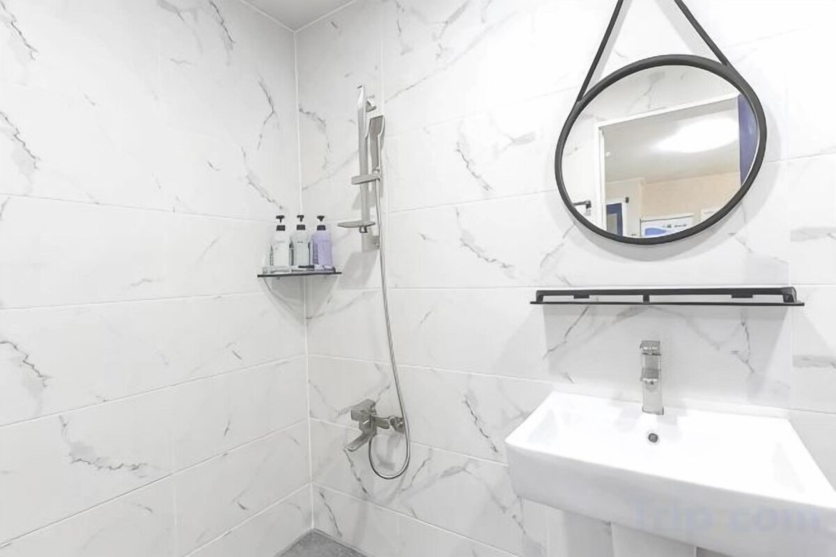 Bathroom | Hair dryer, slippers, towels, soap