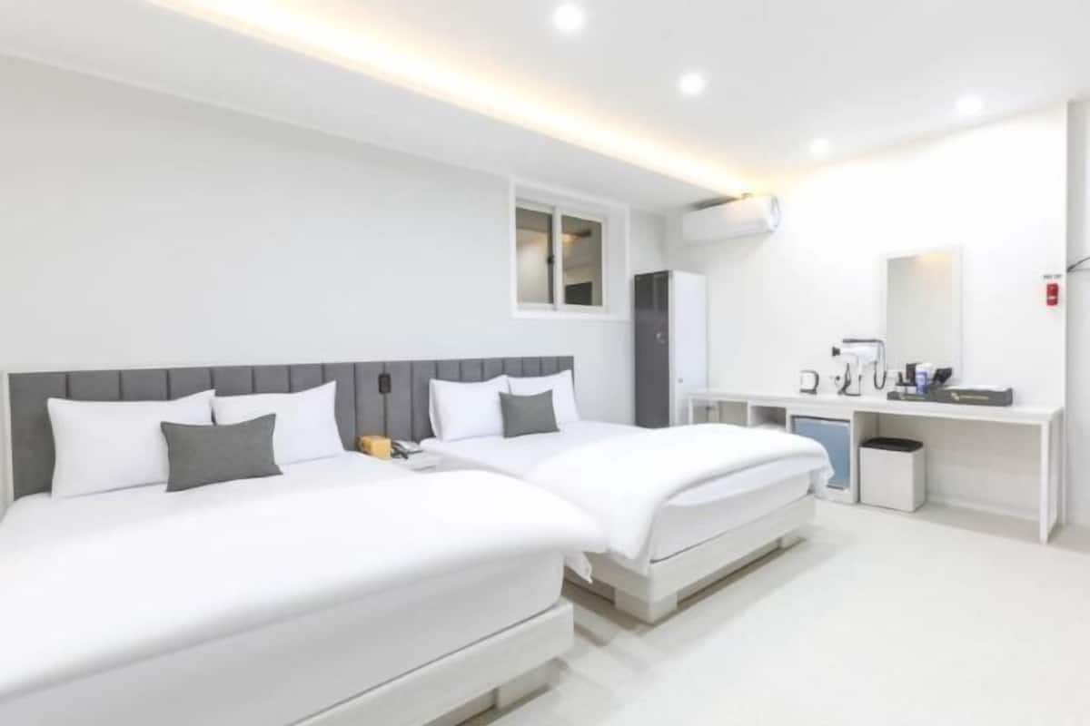 Laptop workspace, free WiFi, bed sheets