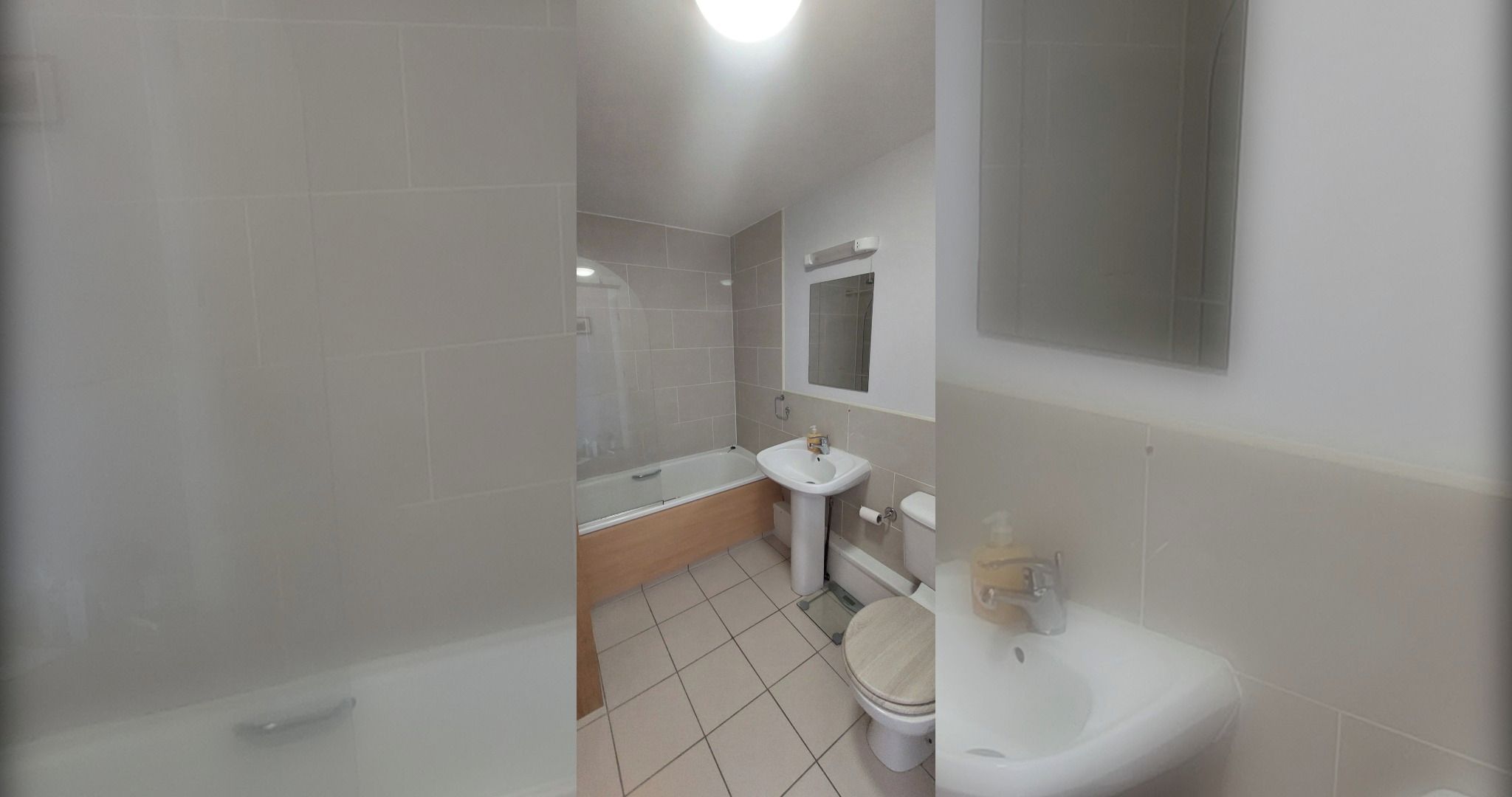 Ein Badezimmer mit einer Badewanne, einem Waschbecken und einer Toilette.