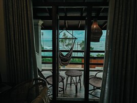 Habitación Deluxe doble, patio, vistas a la playa | Zona de estar