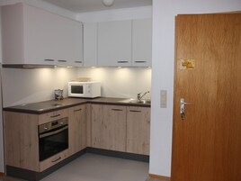 Apartment | Private kitchen | Electric kettle, toaster, highchair