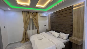 Deluxe Room, Balcony, City View | Desk, laptop workspace, free WiFi