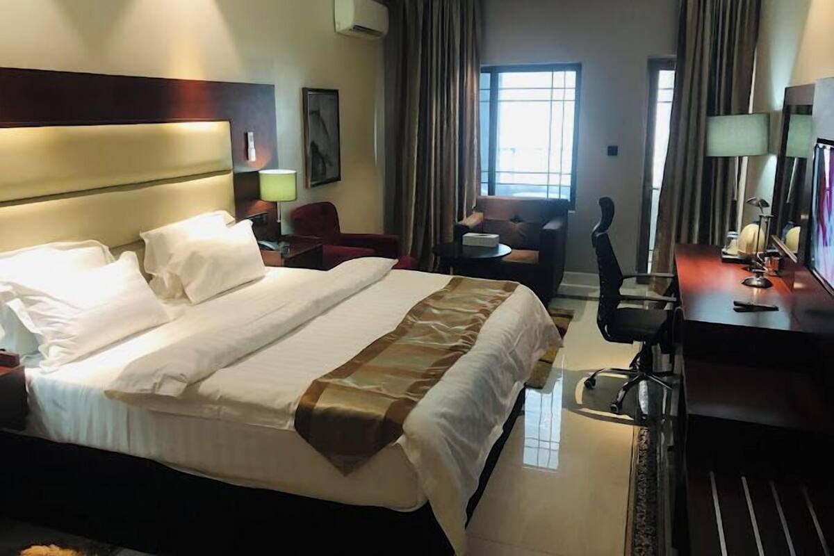 Deluxe Room, Balcony, City View | Desk, laptop workspace, free WiFi